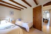 Looking out to the open plan living-room from Bedroom 1.