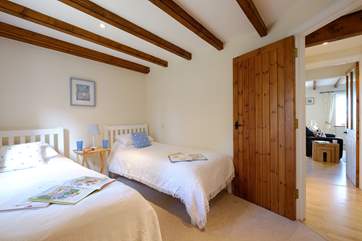 Looking out to the open plan living-room from Bedroom 1.