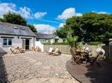 Enjoy peaceful surroundings and a gorgeous view from the back garden at Linhay Cottage.