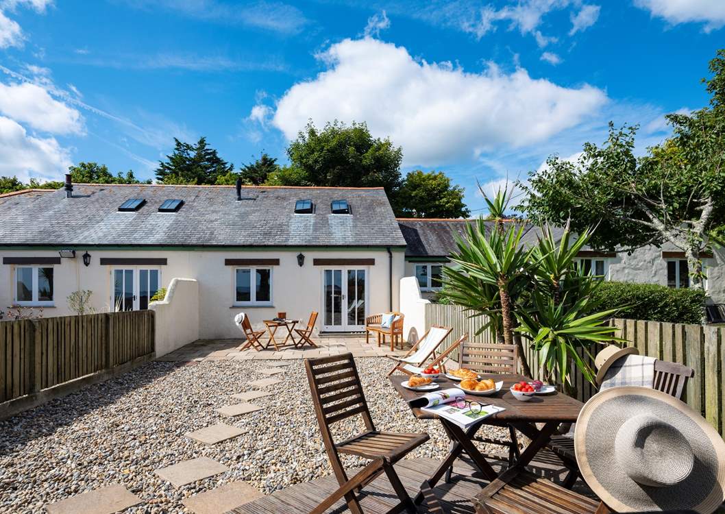 The outdoor area is enclosed and perfect for catching the Cornish sun.
