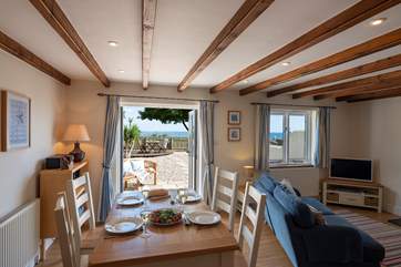French doors lead out to the garden where you can enjoy views towards Gull Rock and beyond.
