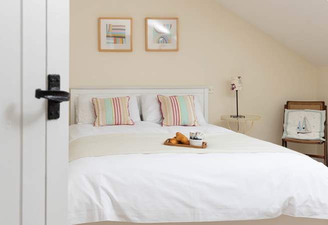 Bedroom 2 is spacious and has the added benefit of an en suite shower-room.