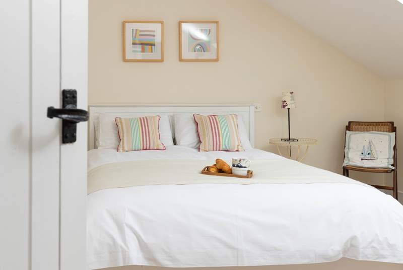 Bedroom 2 is spacious and has the added benefit of an en suite shower-room.
