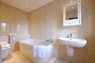 Relax in a deep bath after walking the coast path.