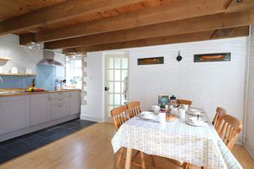The kitchen leads through to the utility room.