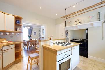 The kitchen area showing the ornamental Rayburn, looking towards the dining-room.