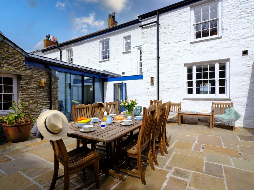 The enclosed rear courtyard, perfect for al fresco dining.