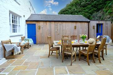 The utility room is at the rear of the courtyard.