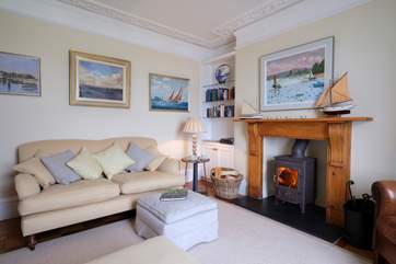 Snuggle up in the cooler months in front of the woodburning stove.