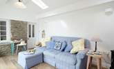 Relax with a good book in the garden-room which overlooks the rear courtyard. - Thumbnail Image