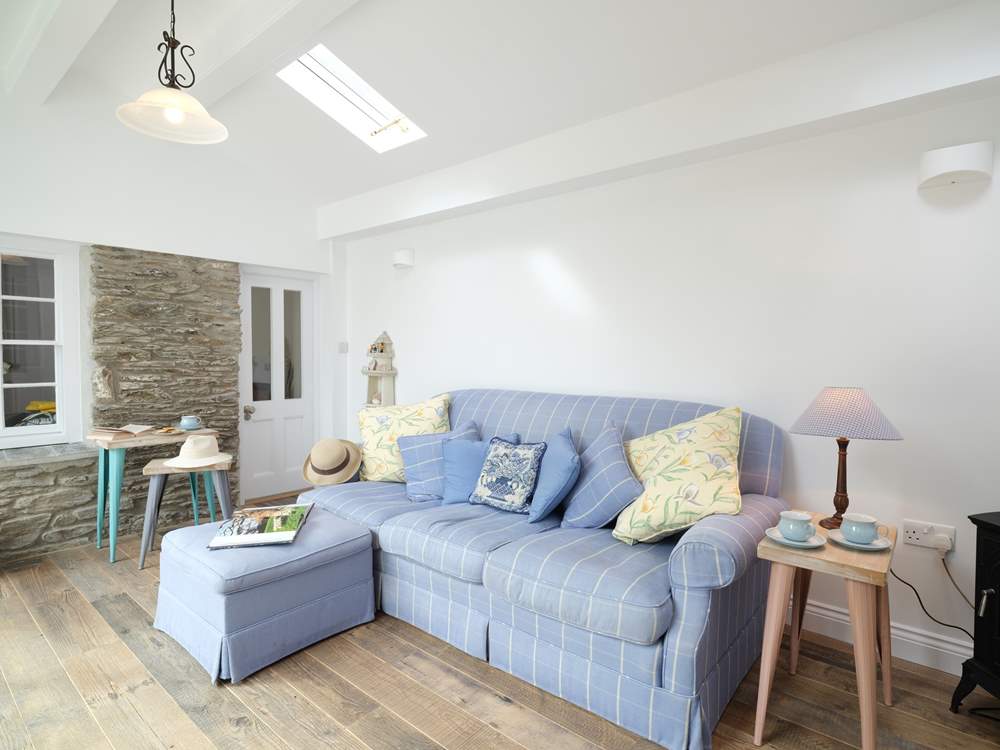 Relax with a good book in the garden-room which overlooks the rear courtyard.
