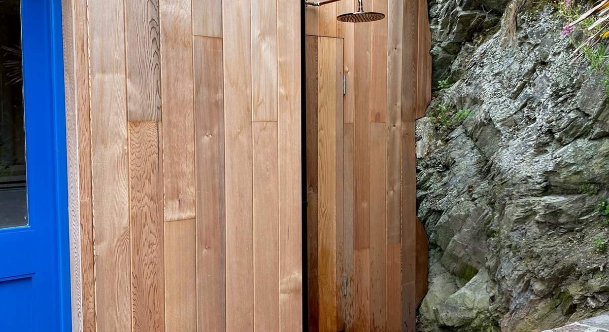 There is a useful outdoor shower for washing off salty toes and wetsuits after a day on the beach.