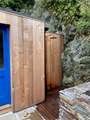 There is a useful outdoor shower for washing off salty toes and wetsuits after a day on the beach.