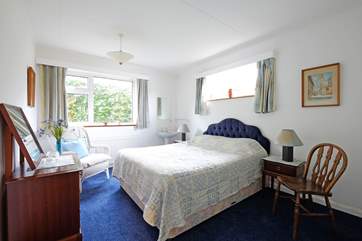 Bedroom 1 on the ground floor has a double bed and a wash-basin.