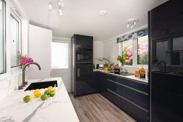The modern kitchen has all the equipment you will need.