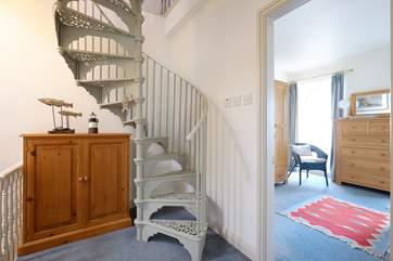 The spiral staircase leads up to Bedroom 4.