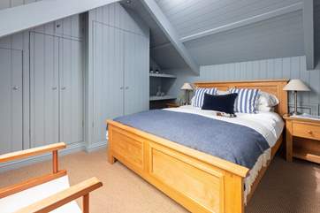 Lovely bedroom 4 is tucked away at the top of the house on the second floor.