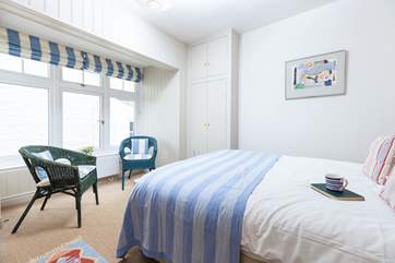 Sit in the bay window and enjoy your book with a view of the sea.