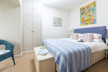 Lovely bedroom 2 has a king-size bed.