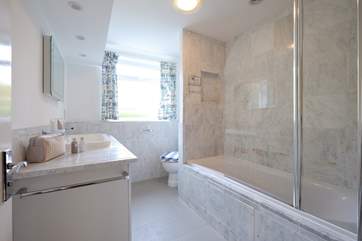 The family bathroom is light and spacious.