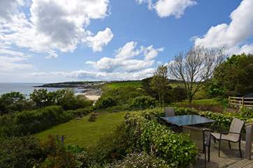Enjoy alfresco meals on the terrace listening to the waves on the beach.