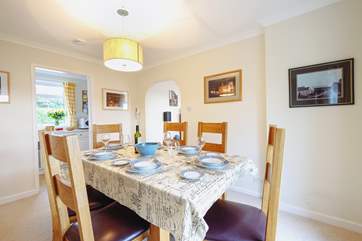 Gather the party and enjoy a delicious meal together in the dining room.