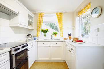 A neat kitchen well equipped for all your holiday needs.