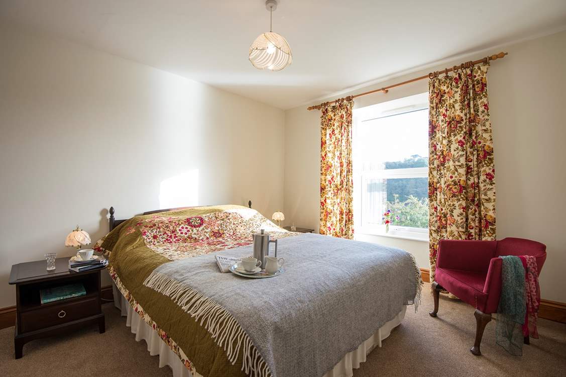 Bedroom 1 has a comfy king-size bed.