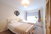 Bedroom 1 has twin beds, perfect for either children or adults.