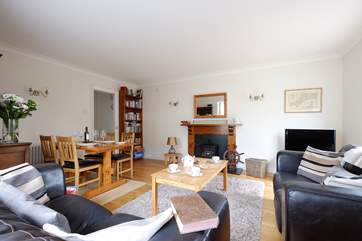 The sitting/dining-room is cosy and welcoming.