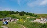 Dine at the Hidden Hut with stunning views over Porthcurnick beach. - Thumbnail Image