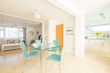 The open plan living space is beautifully furnished.