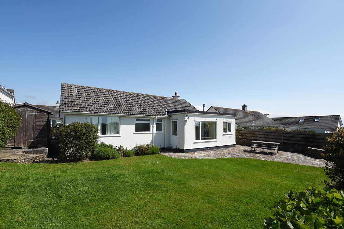 And a peaceful back garden, perfect for al fresco dining and for the children and family dog to let off steam.