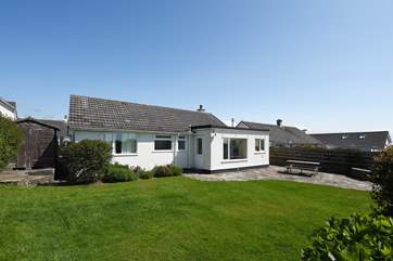 And a peaceful back garden, perfect for al fresco dining and for the children and family dog to let off steam.
