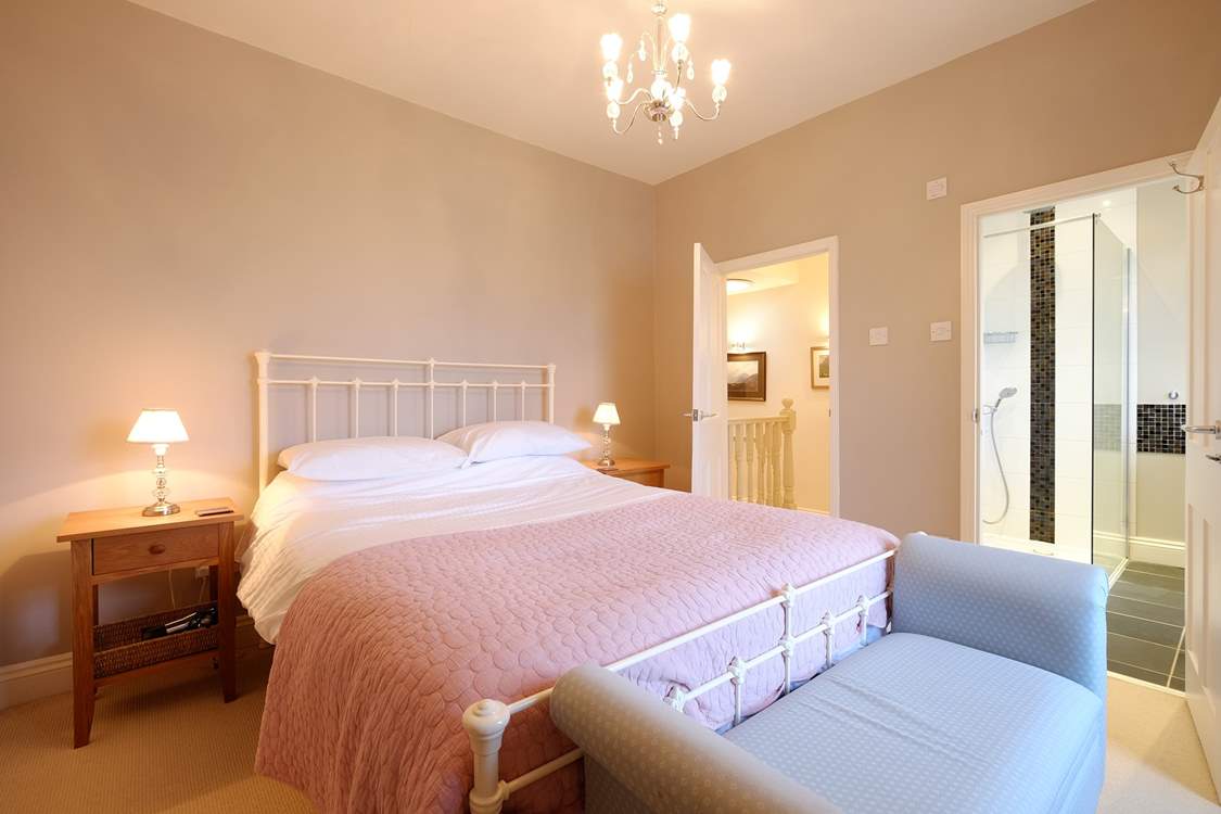 Bedroom 1 has an en suite shower-room.