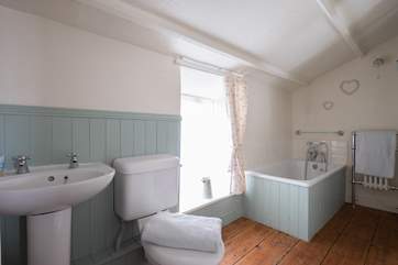 The bathroom with three-quarter size bath and walk-in shower.