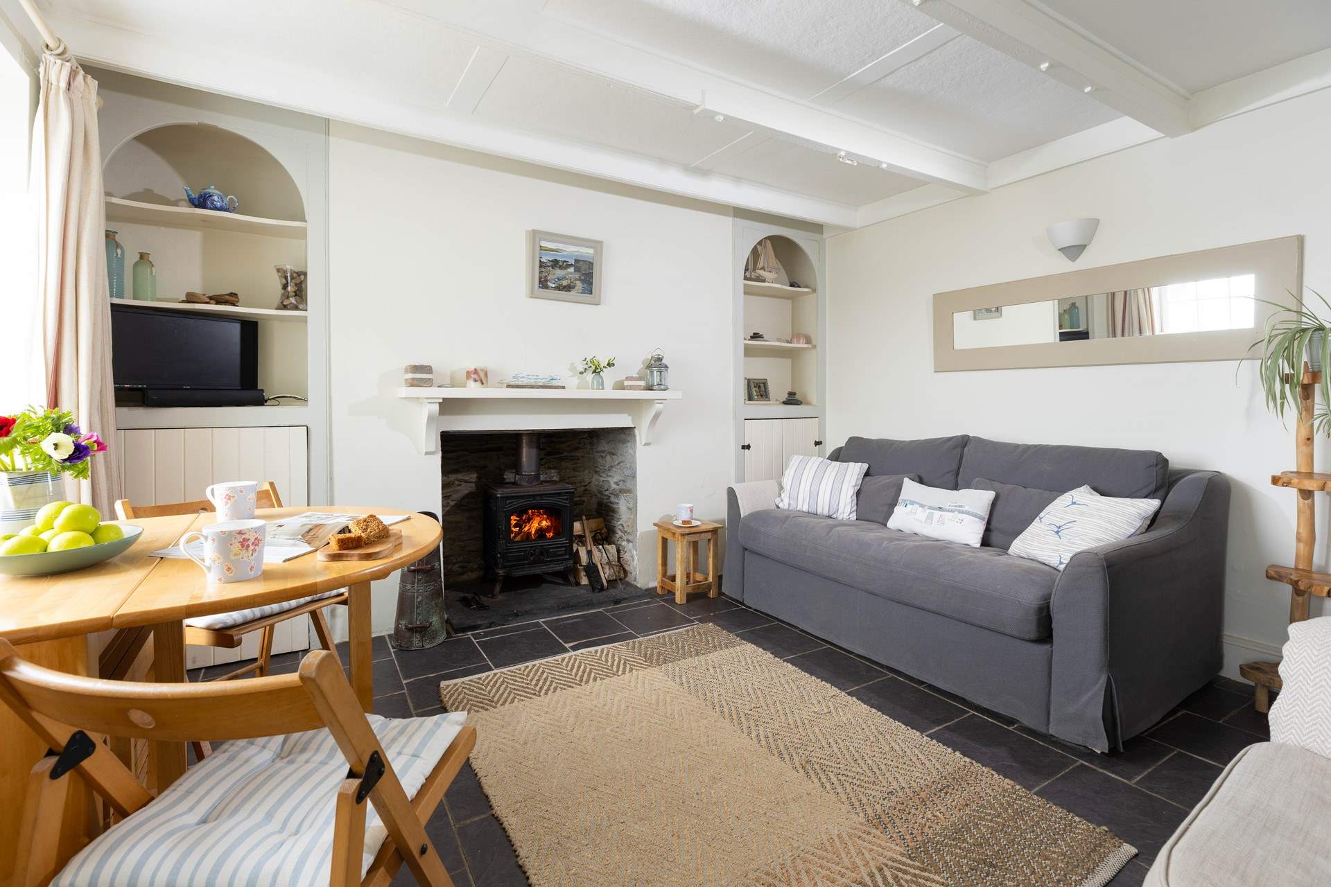 The sitting-room has a multi-burner to keep you cosy throughout the year.