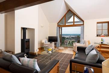 The bi-fold doors open out to the balcony.