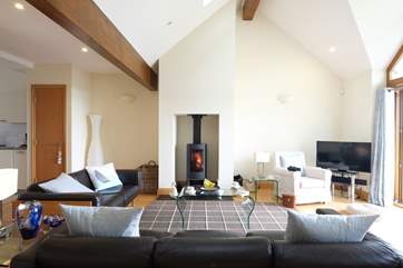 Relax in front of the cosy wood-burner.