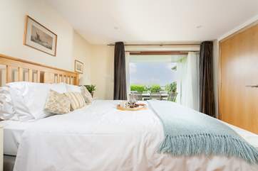 Bedroom 1 is on the ground floor, with direct access to the garden and patio.