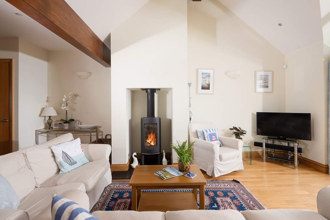 The warming wood-burner will keep you cosy whatever the season.