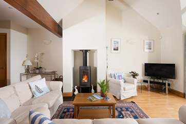 The warming wood-burner will keep you cosy whatever the season.