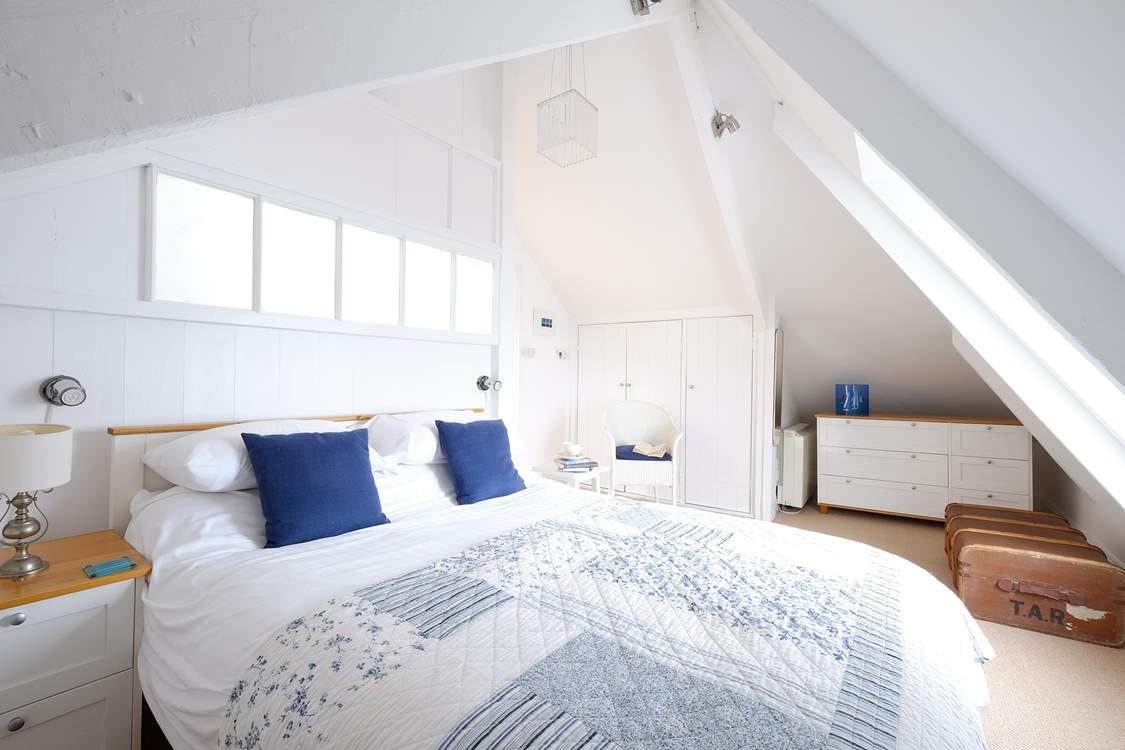 Bedroom 3 on the second floor has a king-size bed.
