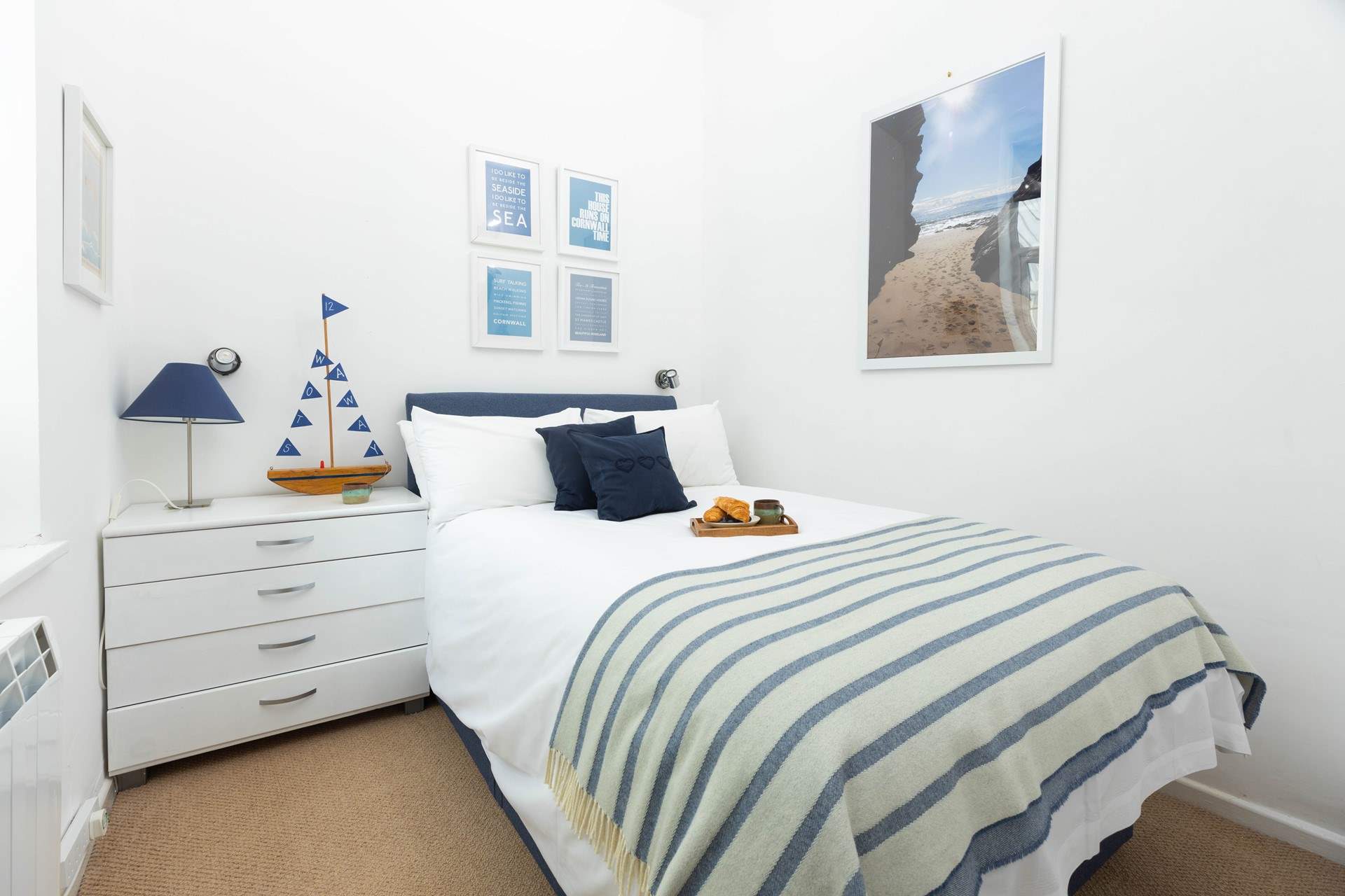 Bedroom 2 is a nautically themed room with a small double.