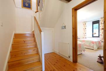 Stairs leading up to the open plan living space.