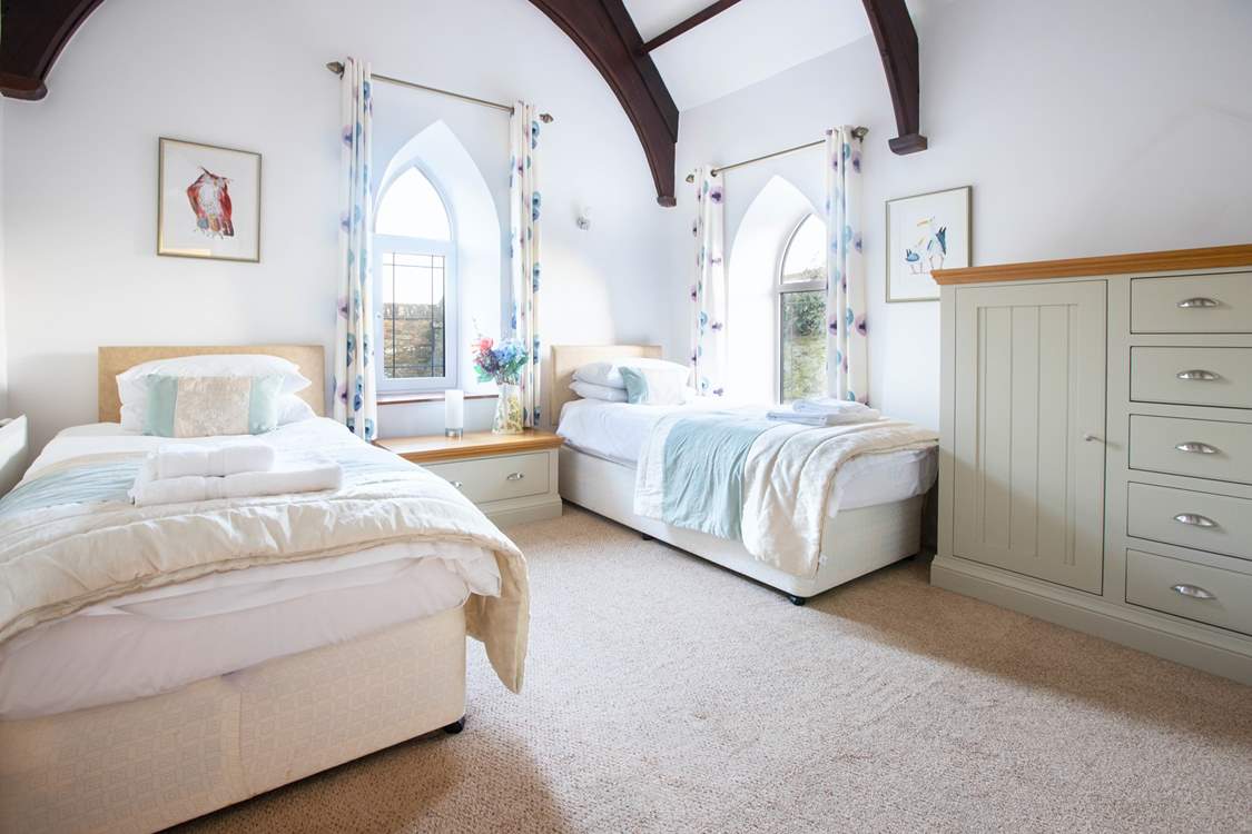 Bedroom 1 has twin beds.