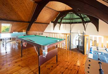 There is a games-area on the mezzanine level.