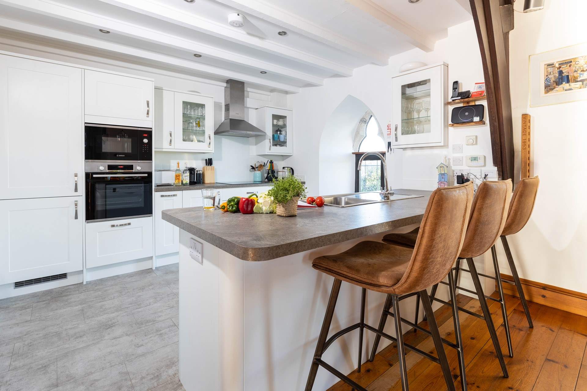 Perch at the breakfast bar and supervise the chef!