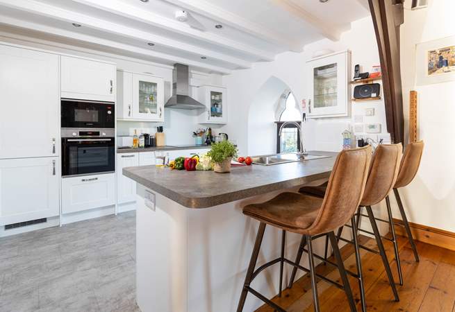 Perch at the breakfast bar and supervise the chef!