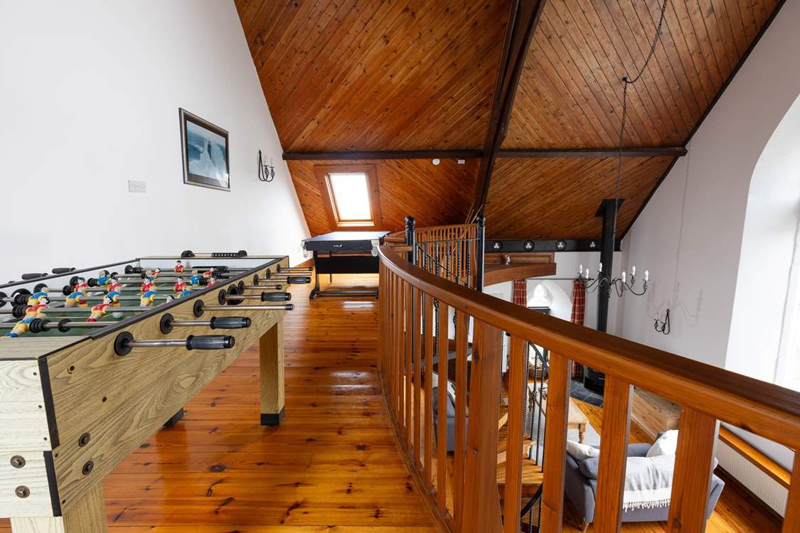 Enjoy some games in the mezzanine.